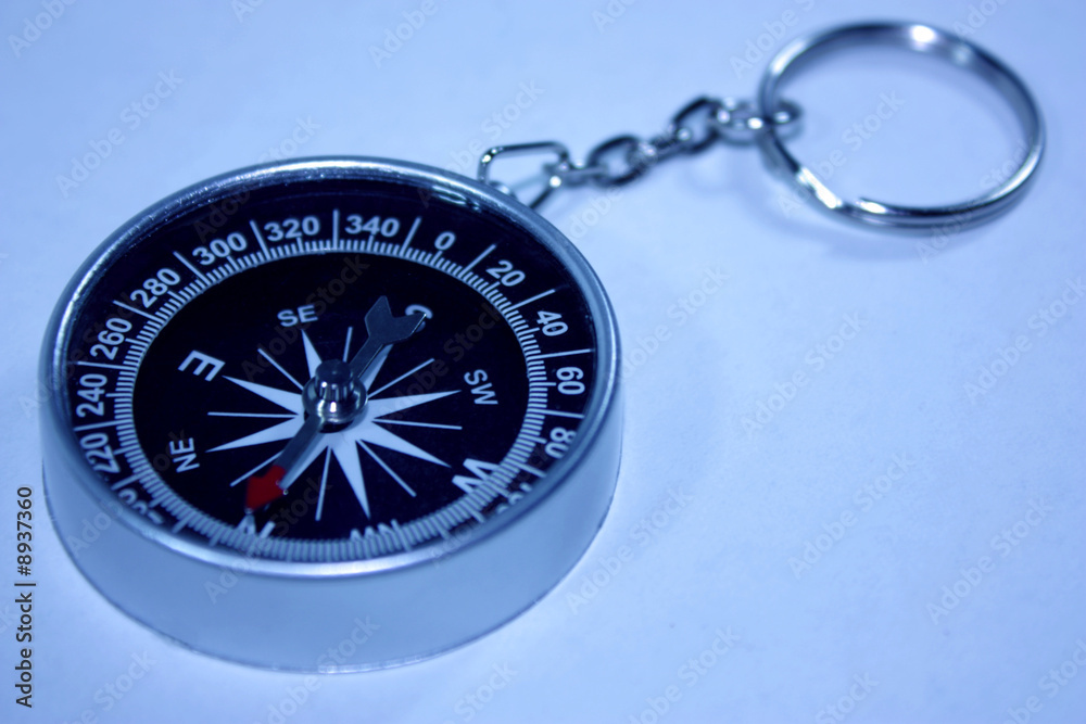 Black compass isolated on a white background