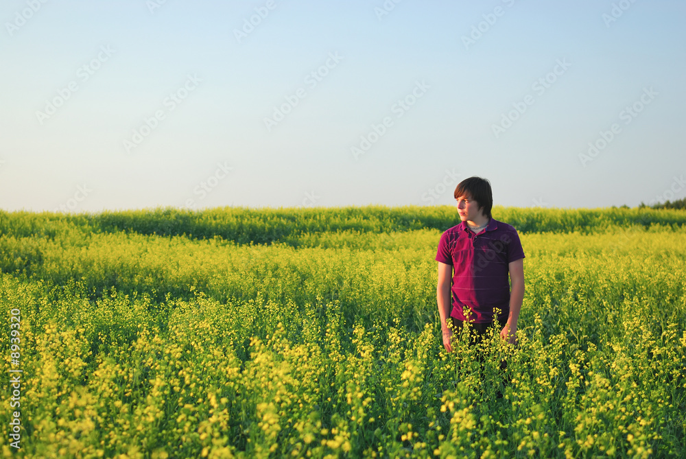 Young Man in Canola Field