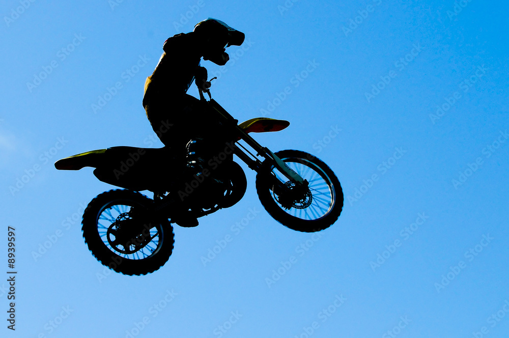 motocross rider making a high jump motocross rider making a high jump