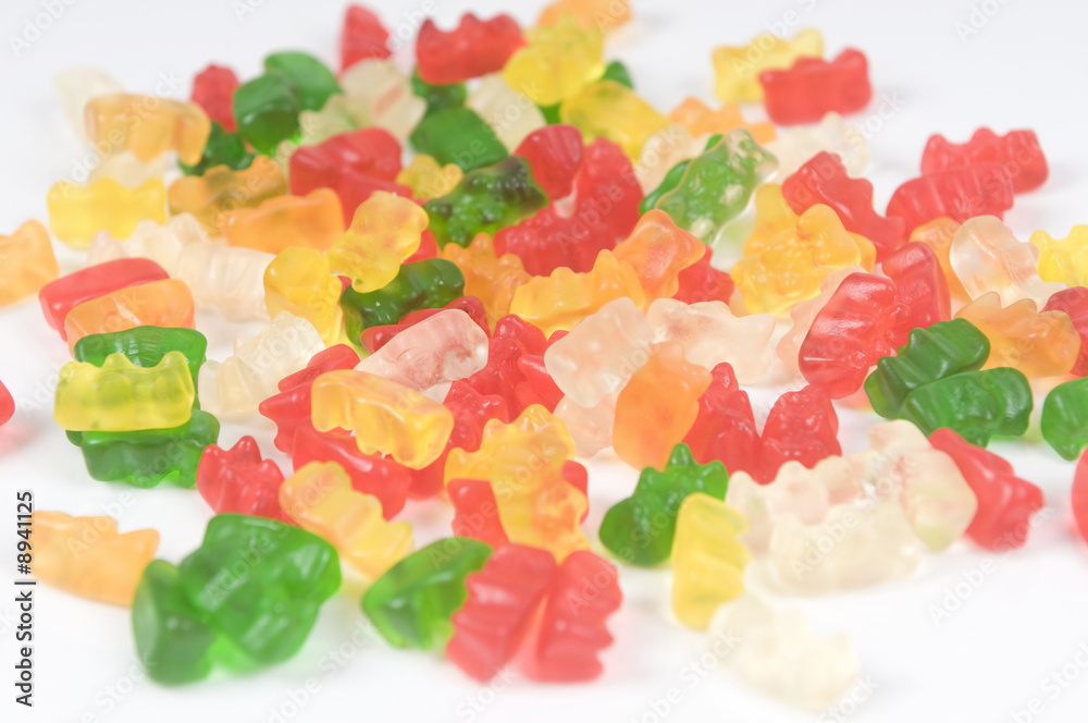 a lot of gelatin bears on a table a lot of gelatin bears on a table
