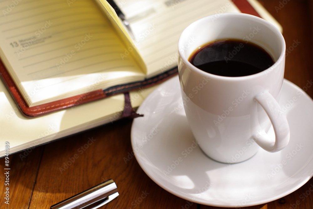 tasse kaffee und terminkalender
