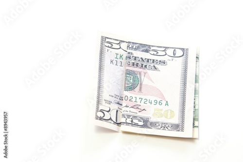 Folded $50 Bill on white background.