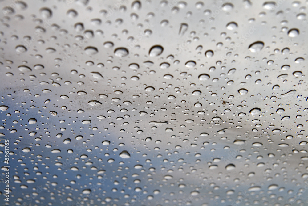 Background: rain drops on a polyethylene awning Background: rain drops on a polyethylene awning