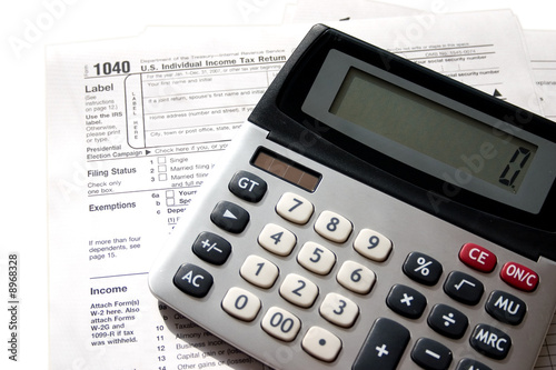 Billede på lærred tax papers with a calculator on top