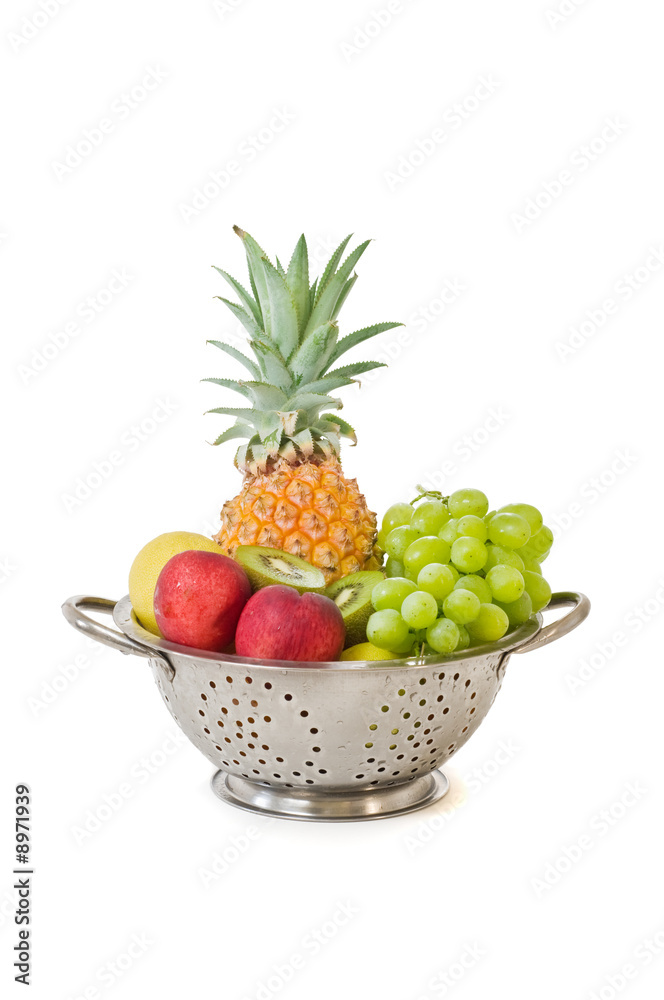 Fresh tropical fruits isolated on a white background