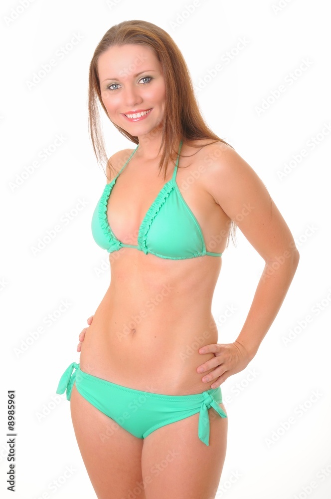 Isolated lovely and sexy young girl wearing a bikini Isolated lovely and sexy young girl wearing a bikini
