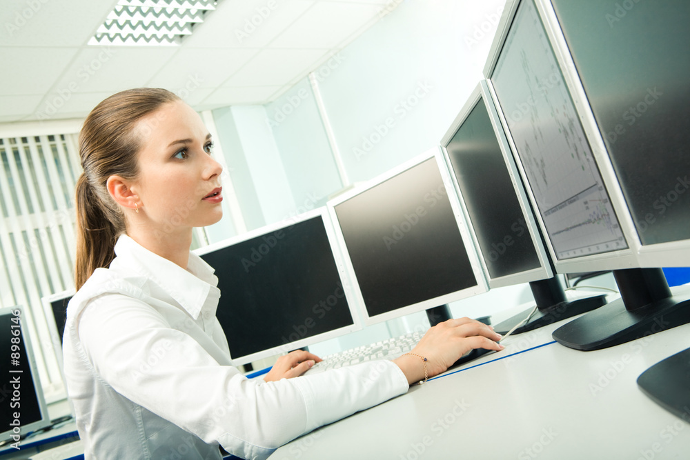 Image of pretty student sitting in front of computer Image of pretty student sitting in front of computer