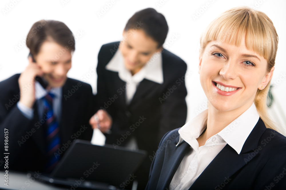 Image of happy businesswoman looking at camera Image of happy businesswoman looking at camera