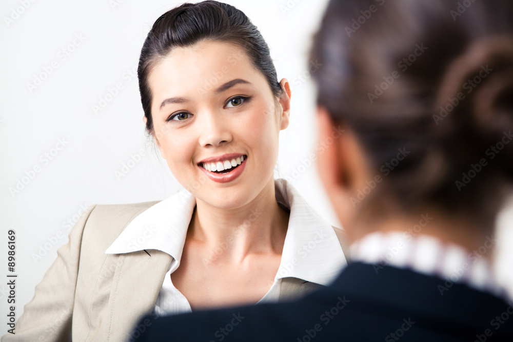 Portrait of confident business lady looking at partner Portrait of confident business lady looking at partner