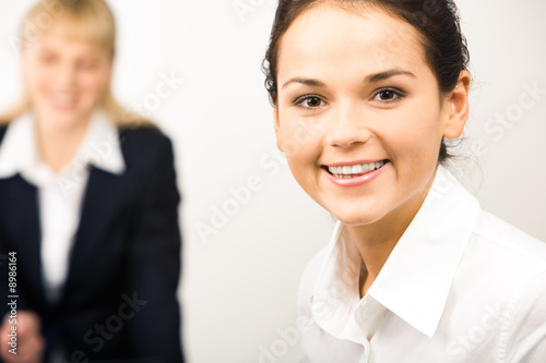 Portrait of smiling businesswoman looking at camera