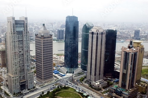 Aerial view of Shanghai city with skyscrapers and Huangpu river