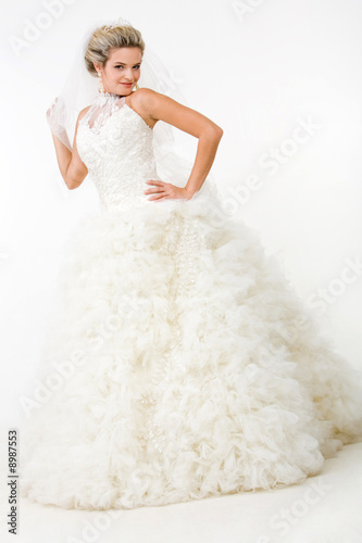 Image of elegant bride in fashionable white wedding gown