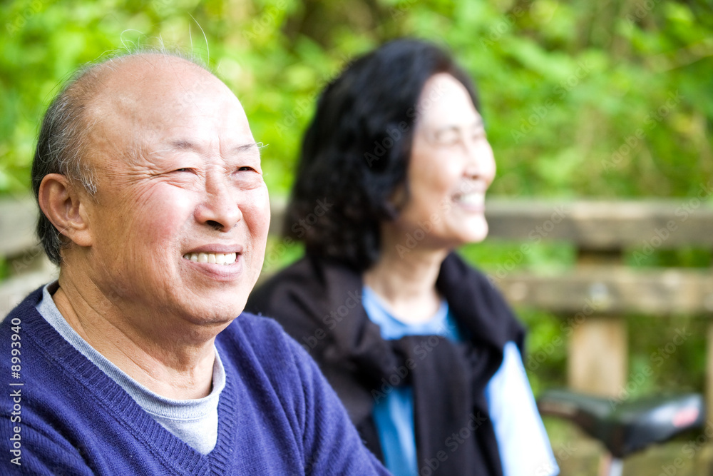 A shot of a couple of happy asian senior outdoor