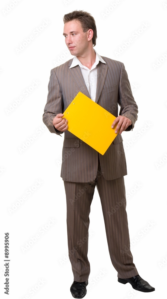 Young businessman with yellow folder on a white background. Young businessman with yellow folder on a white background.
