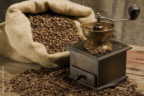 Coffee beans and coffee grinder photo