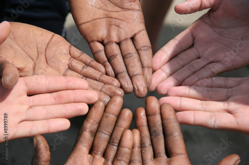 Black and white hands next to each other