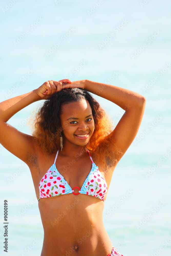 Naklejka premium Woman smiling in a bikini