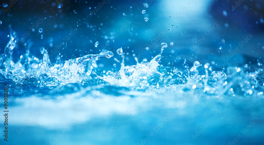 Water splashes closeup. Blue tint. Water splashes closeup. Blue tint.