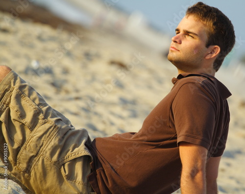 Man sitting on the sand