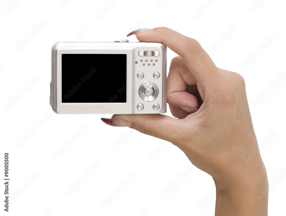 digital camera in a hand isolated on white digital camera in a hand isolated on white