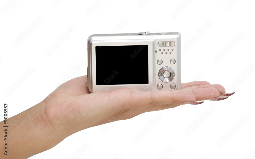 digital camera on a hand isolated on white digital camera on a hand isolated on white