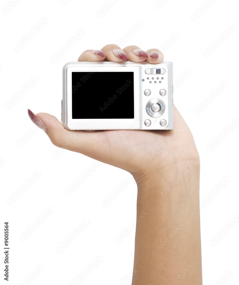 digital camera in a hand isolated on white digital camera in a hand isolated on white