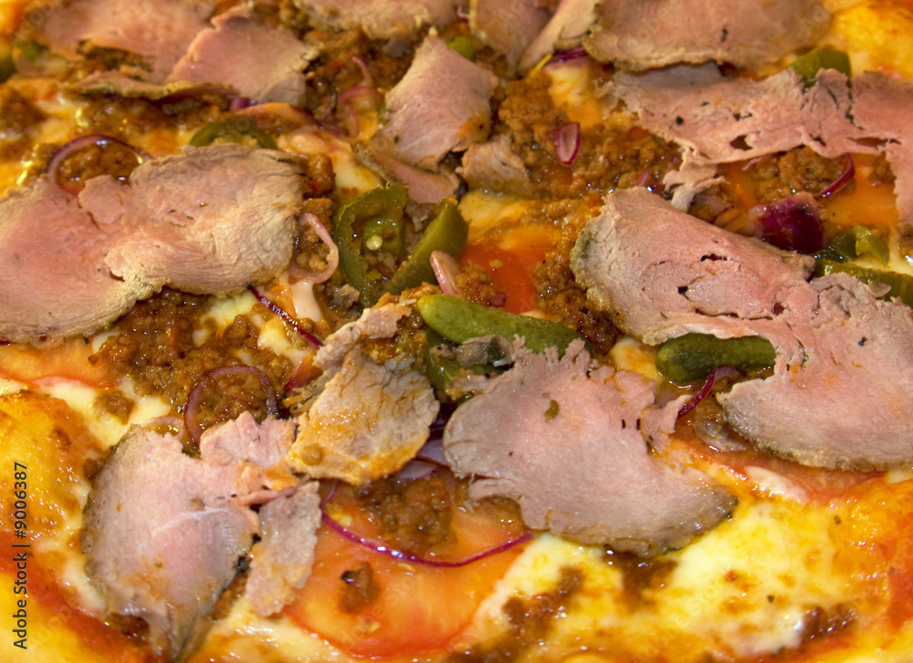palatable pizza with meat slices close up palatable pizza with meat slices close up