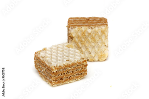 Two pieces of cappuccino cream filled wafer cubes.