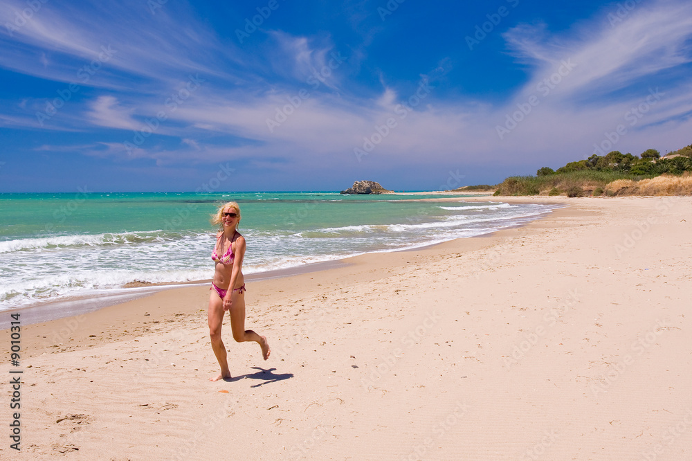 a beutiful woman on the beach in Mediterranean a beutiful woman on the beach in Mediterranean