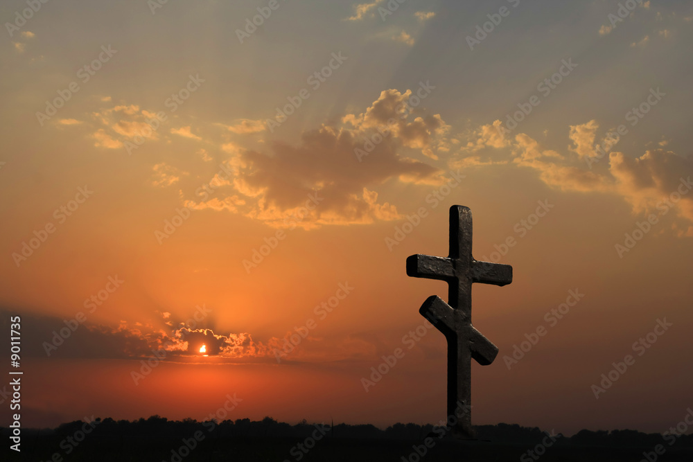 Cross and red sunset