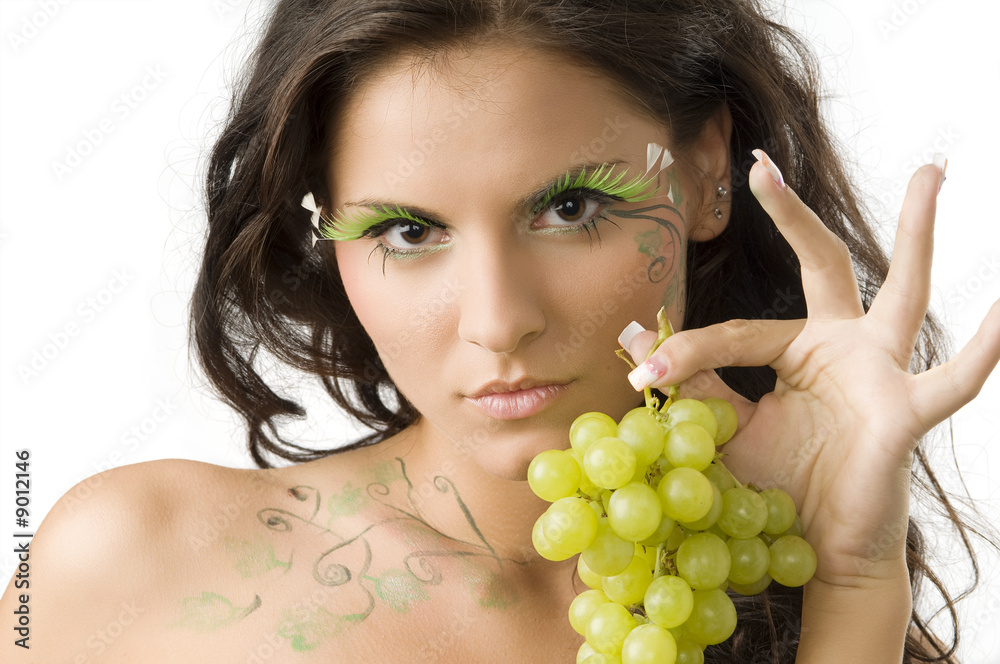pretty and sensual girl with bodypaint and eyelashes showing pretty and sensual girl with bodypaint and eyelashes showing