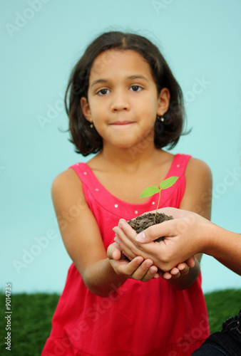 Woman Holding A New Plant I...