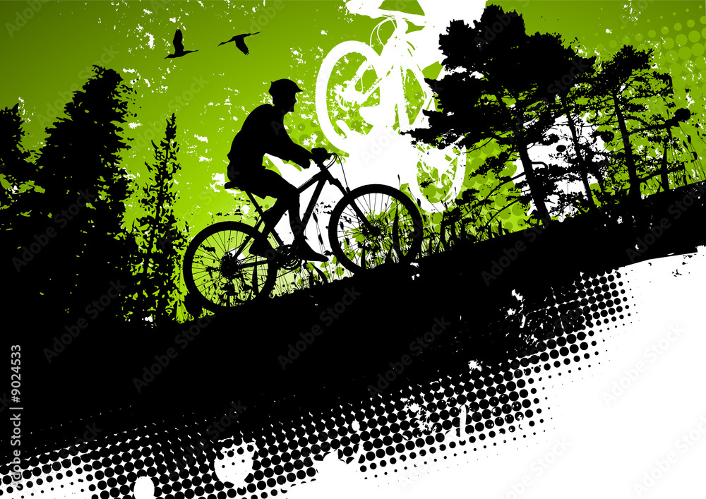 Obraz premium Mountain bike in a forest abstract background