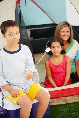 Family In A Tent On Their C...
