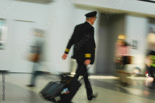 Wallpaper Mural A man in hurry in airport hall Torontodigital.ca