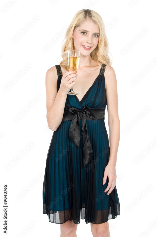 An attractive young woman holding a glass of champage An attractive young woman holding a glass of champage