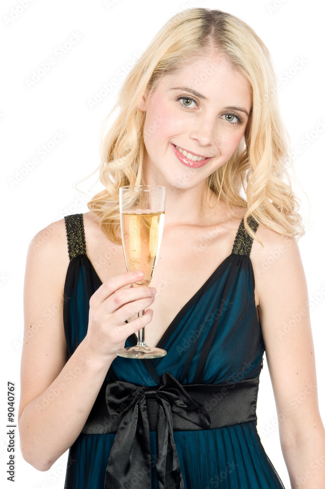 An attractive young woman holding a glass of champage An attractive young woman holding a glass of champage