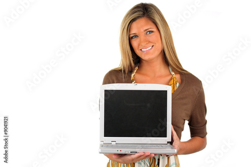 Happy young woman holding a...