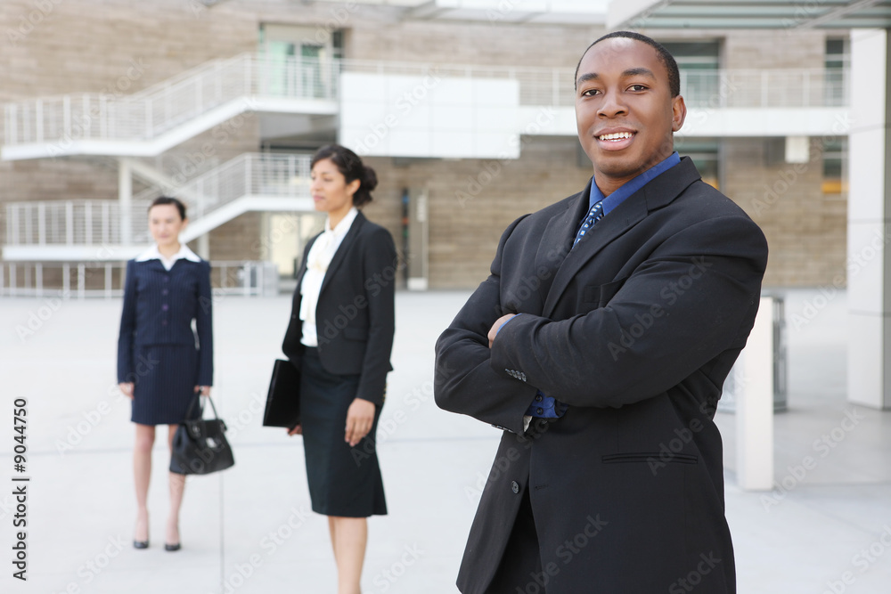 Handsome african american business man with team Handsome african american business man with team