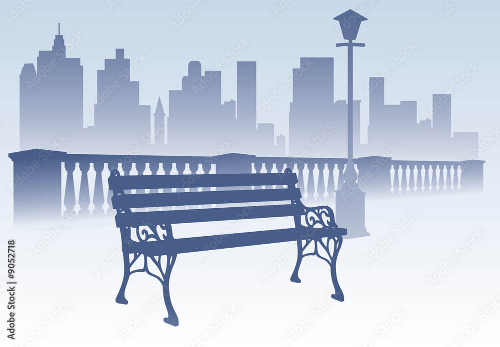 Naklejka premium Park bench on the city background