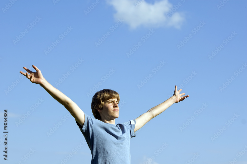 In tune with nature. Young boy showing happiness In tune with nature. Young boy showing happiness