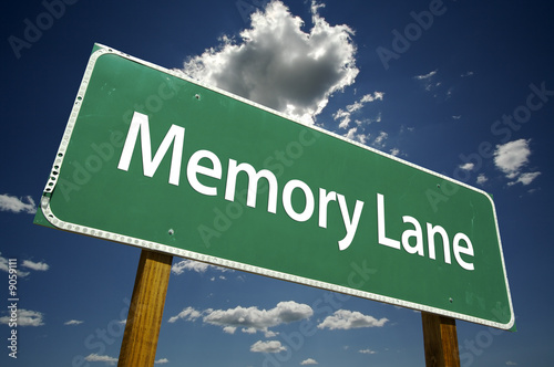 Memory Lane Road Sign with dramatic clouds and sky.