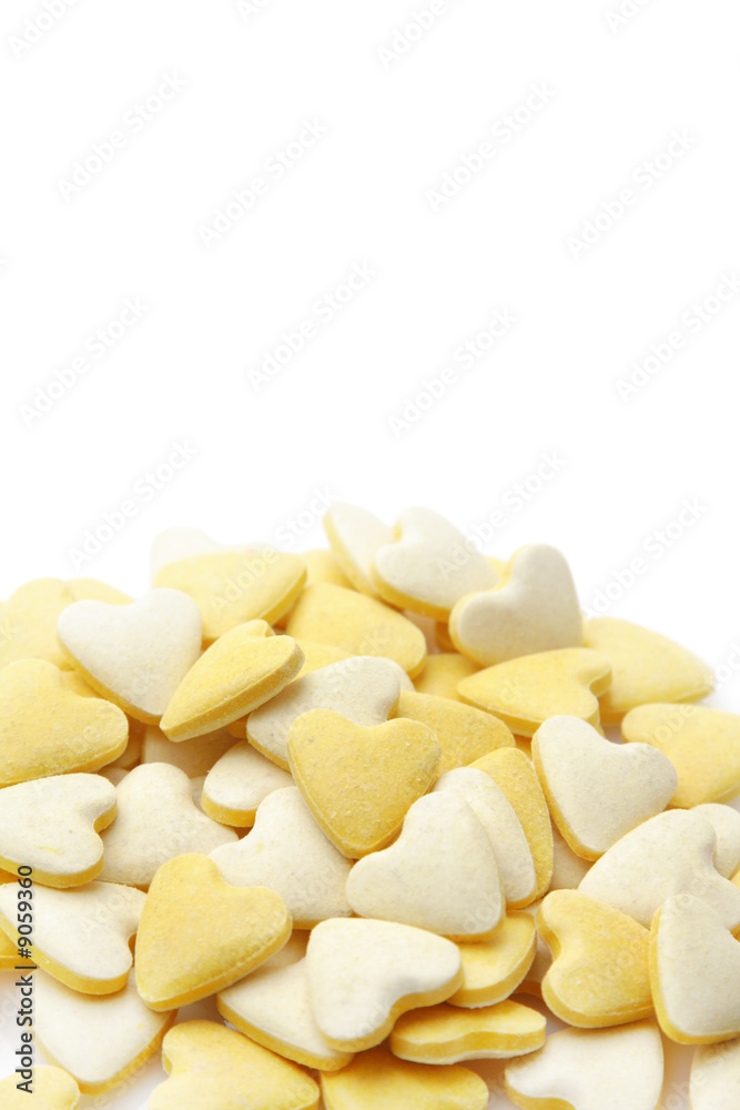 Pile of vitamin tablets isolated over white background Pile of vitamin tablets isolated over white background