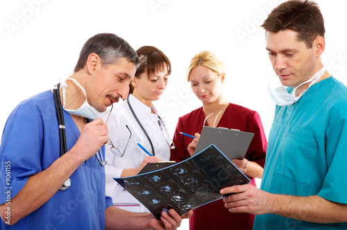 nurse, two male and one female doctors with schedule