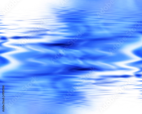 Water background with some soft blue ripples
