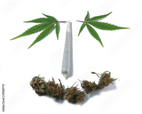 Marijuana cigarette with leafs in shape of smiley