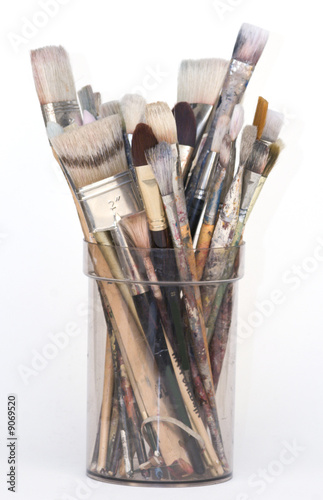 Pot of used artist brushes