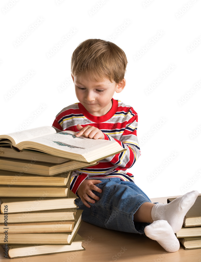 Little boy with a heap of books Little boy with a heap of books
