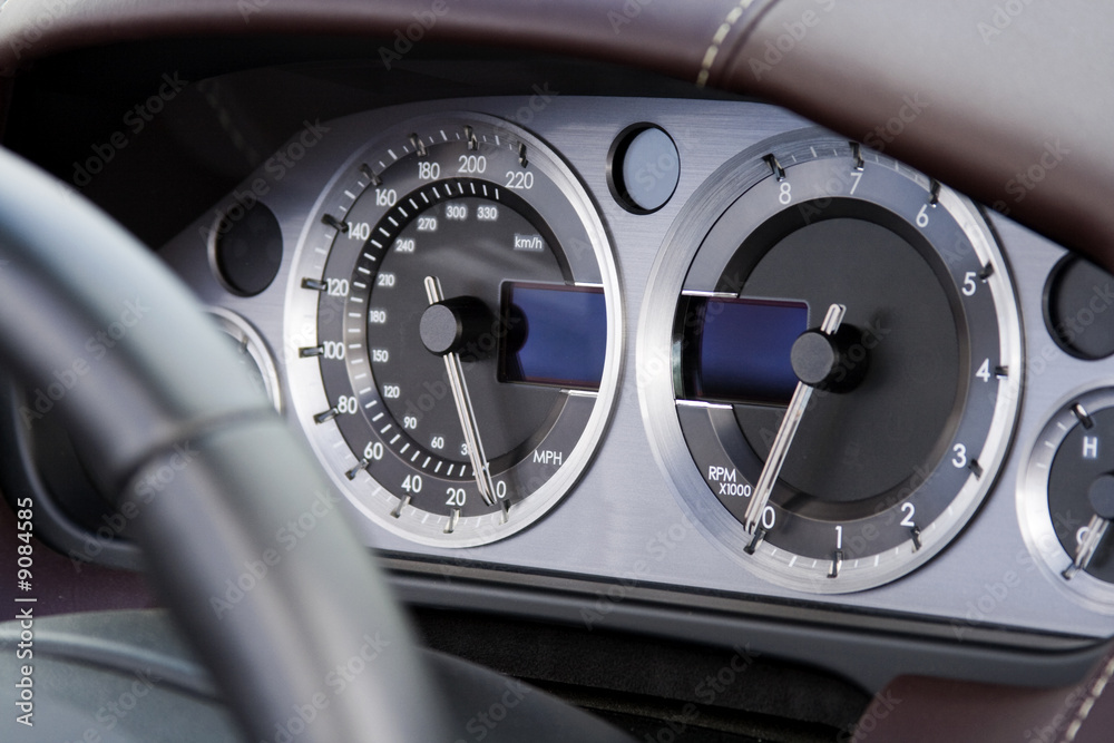 chrome dials on fast expensive modern car