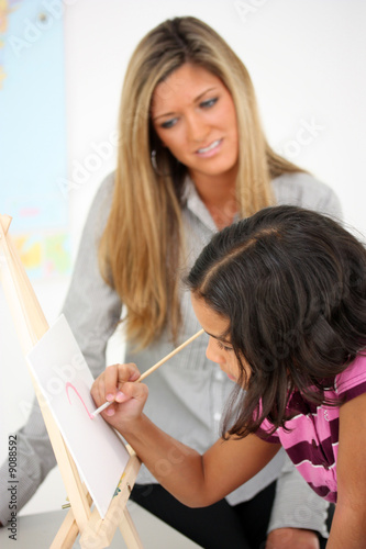 Teacher and Art Student In ...